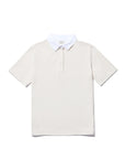 The Terry Polo by Kule: an off-white cotton terry short-sleeve polo with a contrasting white collar and three-button placket, shown flat on a white background—ideal for sporty chic beachwear.