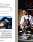 Two chefs in brown aprons prepare food in rustic settings—one outdoors by mountains and water, the other indoors with seafood and vegetables—highlighting gourmet experiences featured in "150 Restaurants" by Simon & Schuster Inc.
