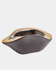 The Global Views Formation Bowl features an organic, metallic design with smooth, undulating edges and a shiny silver and gold finish, displayed against a plain white background.