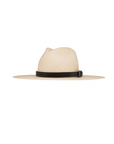 The Ninakuru Coda Hat, a beige wide-brimmed design crafted from toquilla straw, showcases a sleek leather band with a bronze buckle, pictured in a side view against a white background.