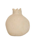 The Faire Turner Pomegranate is a small, round, beige ceramic decor piece with a crown-like top and smooth, unglazed surface—perfect for adding rustic charm to your home—shown here against a plain white background.