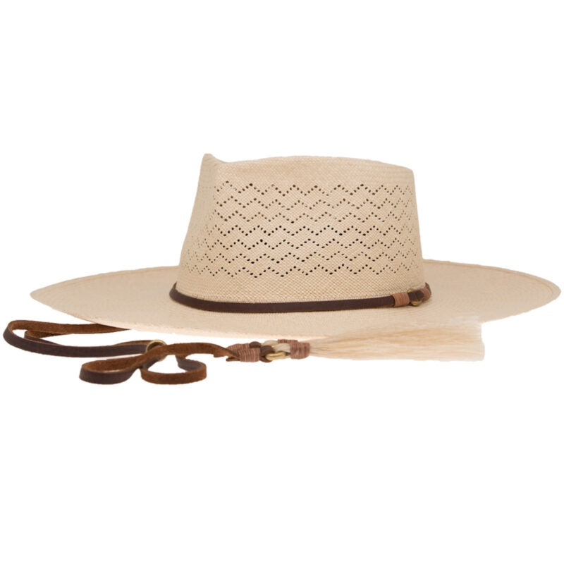 A stylish beige Paloma hat made of Toquilla straw, featuring a teardrop crown and adorned with a brown leather band and a tassel by Ninakuru.