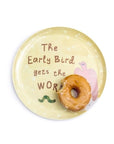 The Breakfast Club Plate Set by Sugarboo Designs features a donut on a round plate with "The Early Bird gets the Worm," plus a pink bird and green worm—perfect for your Breakfast Of Champions.