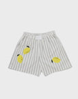 Kule's The Limon shorts feature white and gray vertical stripes, an elastic waistband, and three playful lemon appliqués with green leaves on the front—a fun nod to the Amalfi Coast.