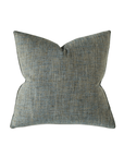 The Eastern Accents ROWLEY WOVEN TEAL pillow features a textured blue-gray velvet fabric with a subtle woven pattern, adding elegance to any decor; shown against a white background.
