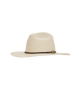 The Lyndon Long Brim by Ninakuru is a beige, wide-brimmed hat made from sustainably harvested Toquilla straw, featuring a brown band and gold embellishment. Its slightly creased crown offers a classic style, while the plain white background highlights its natural color and details.