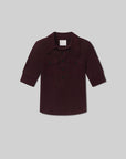The Amina Polo Shirt by Citizens Of Humanity/AGOLDE is a maroon ribbed cotton long-sleeve shirt with a collar, black front buttons, and two chest patch pockets, shown on a light grey background.