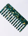 The Faire Hair Comb Assorted, featuring a wide-tooth anti-static design and a green-yellow marbled pattern, is displayed on a white background.