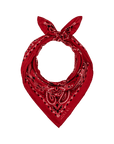 The Silk Bandana by The Great Inc. is a red silk accessory featuring a white and black paisley pattern, folded and knotted at the top for a timeless, vintage-inspired look.