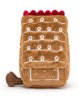 The Amuseables Gingerbread House by Jelly Cat Inc. is a delightful plush shaped like a festive gingerbread house, perfect for cozy holiday décor or as a charming gift.
