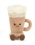 The Amuseables Latte by Jelly Cat Inc. is a plush toy shaped like a latte mug, featuring a creamy foam top, smiling face with black eyes, right-side handle, and brown feet—all set against a white background.