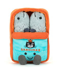 The Amuseables Sardine Tin plush by Jelly Cat Inc. features a blue and orange sardine tin with "SARDINAS" and an embroidered cat on the front, plus two smiling grey sardine plushies inside.