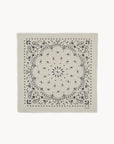 Cream scarf with black paisley pattern and fringed edges, KUJTEN Hachiko in Avoine, cashmere-inspired print.