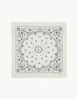 White scarf with black paisley and floral print, KUJTEN Hachiko in Blanc, cashmere-style accessory.