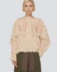 Shay Lace LS Top by Sea New York paired with brown-green cargo pants, styled for a casual modern look.