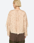 Sea New York Shay Lace LS Top in white lace, shown from the back with brown pants.