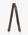 The Clare Vivier Adjustable Crossbody Strap features green and black checkerboard cotton webbing, brown edges, leather ends, an adjustable gold buckle, and gold clasps on both sides.