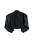 The Ava Cropped Jacket Organza Sleeve by Aquarius Cocktail features shiny black silk organza sleeves and a matte garment dyed cotton body, shown flat from the back against a white background.