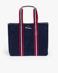 Navy cotton tote with red, white, and black striped handles, Mother embroidery; by The Everywhere for Bungalow Furniture.