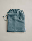 Linen duvet cover in neutral beige by Cultiver Goods, OEKO-TEX certified, displayed flat on a light surface.