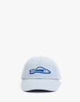 The Clare Vivier Baseball Hat S25 is a light blue embroidered cap with a blue and white fish design on the front, shown against a plain white background.