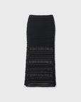 The Rag & Bone britt maxi skirt in black cotton blend features a fitted silhouette, semi-sheer horizontal panels, and a slight flare at the hem—summer-ready and shown against a plain light background.