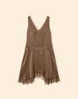 Brown satin slip dress with lace neckline and handkerchief hem by Xirena, shown on a beige background.
