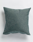 The Gabby Binds Haze Gr-4 Pillow 26x26 is a square teal pillow with a textured fabric surface, custom made for the Bungalow Exclusive collection and set against a white background.