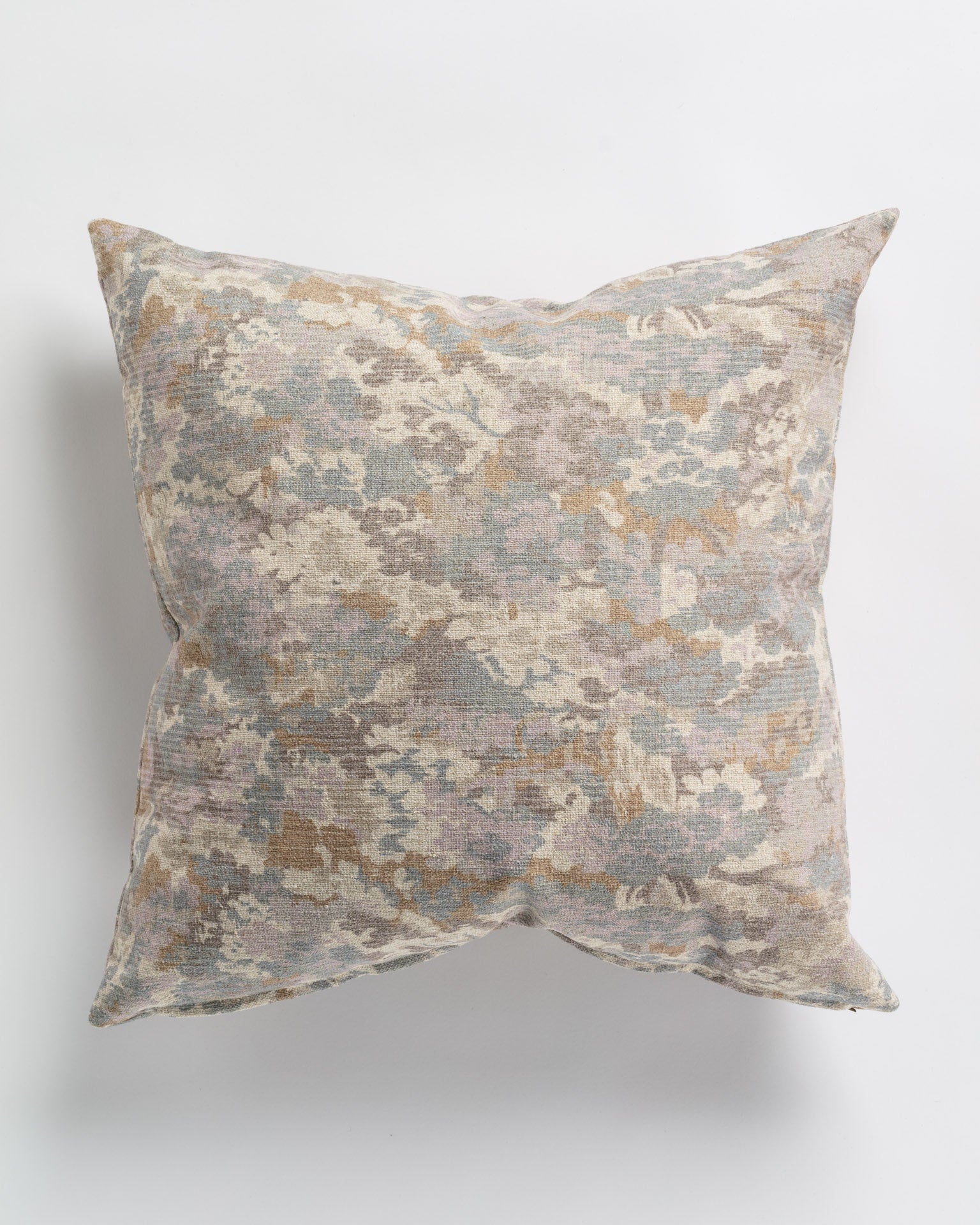 Decorative &quot;Imperial Pastel Pillow 26x26&quot; with a muted floral pattern in shades of beige, gray, and pale blue on a white background, perfect for a Scottsdale Arizona bungalow. The texture appears soft and plush. (Gabby)