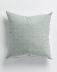 A square-shaped Panini Water Pillow 26x26 with a textured light blue and white fabric, isolated on a white background in bungalow style by Gabby.