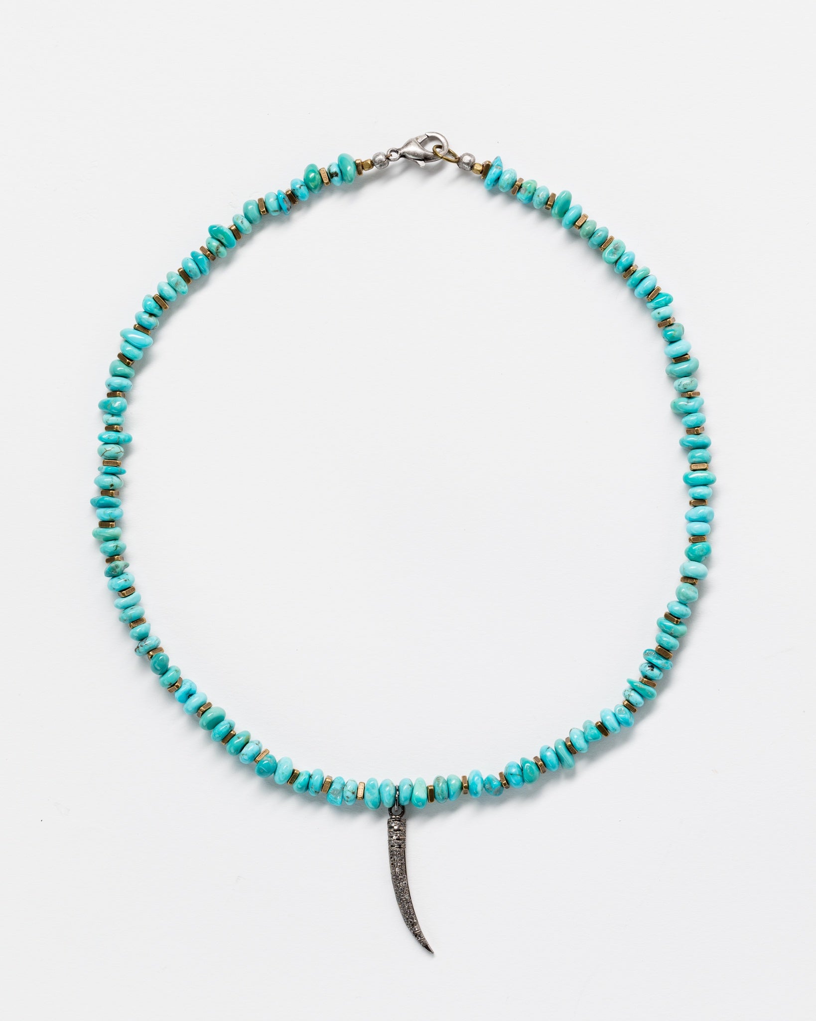 A Designs By Raya necklace featuring a string of turquoise beads, styled in the Arizona fashion, with a central, silver-colored, curved horn pendant against a white background.