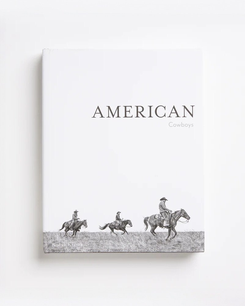 A National Book Network book cover titled "American Cowboys" with a plain white background featuring a black and white illustration of three cowboys riding horses in Scottsdale, Arizona, at the bottom.