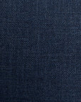 Close-up texture of a dark blue denim fabric, showing detailed Arizona-style weave patterns with visible threads in varying shades of blue Gabby Bermuda Blue Pillow 26x26.