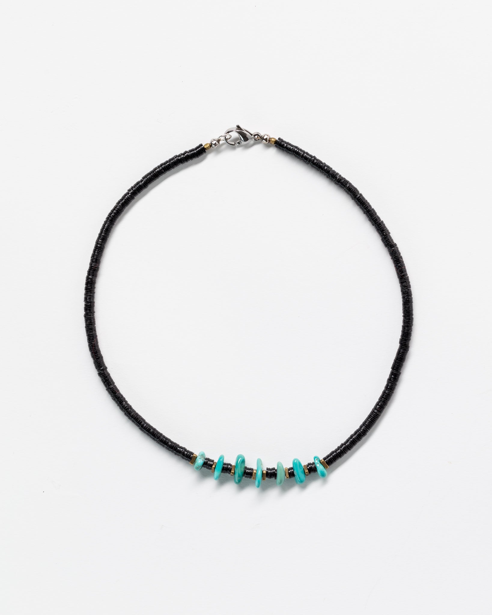 Designs By Raya multi color necklace with Arizona turquoise gemstone accents centered on the strand, against a white background.