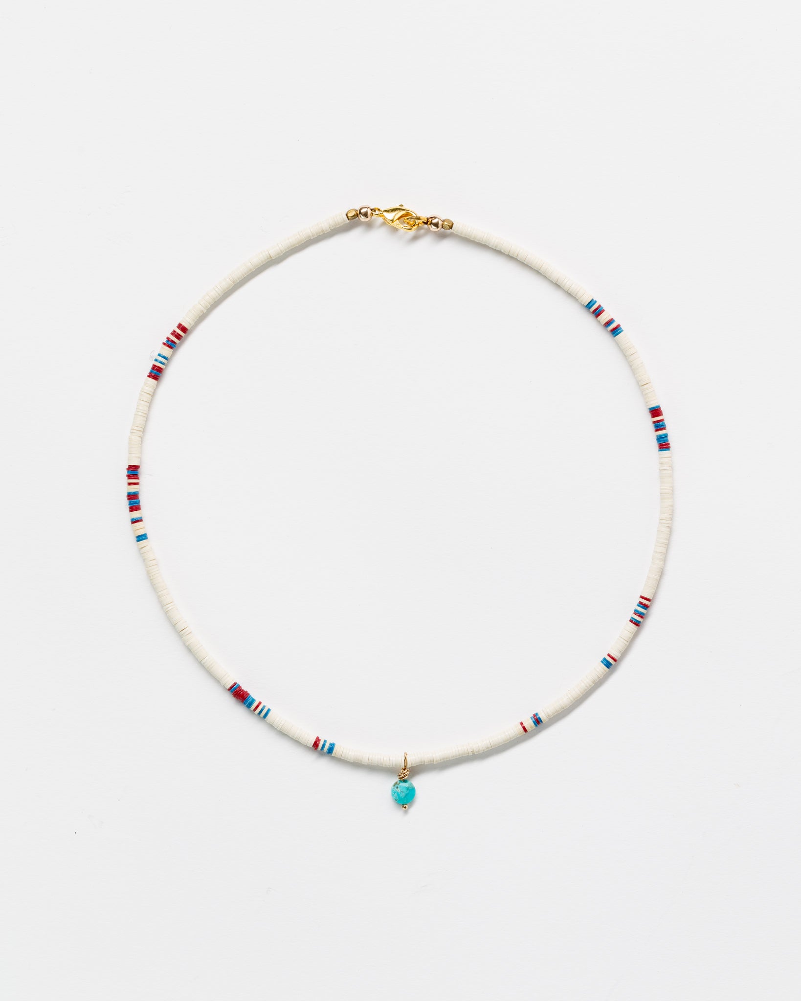 A delicate Designs By Raya choker necklace with small white beads, accented with sparse multicolored beads and an Arizona turquoise pendant, displayed against a plain white background.