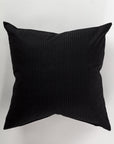The Custom 3 Pillow 28x28 by Pindler features a luxurious black pinstripe design against a light gray background. This euro pillow's square shape and subtle vertical stripes provide both support and comfort while enhancing the design with added texture and pattern.