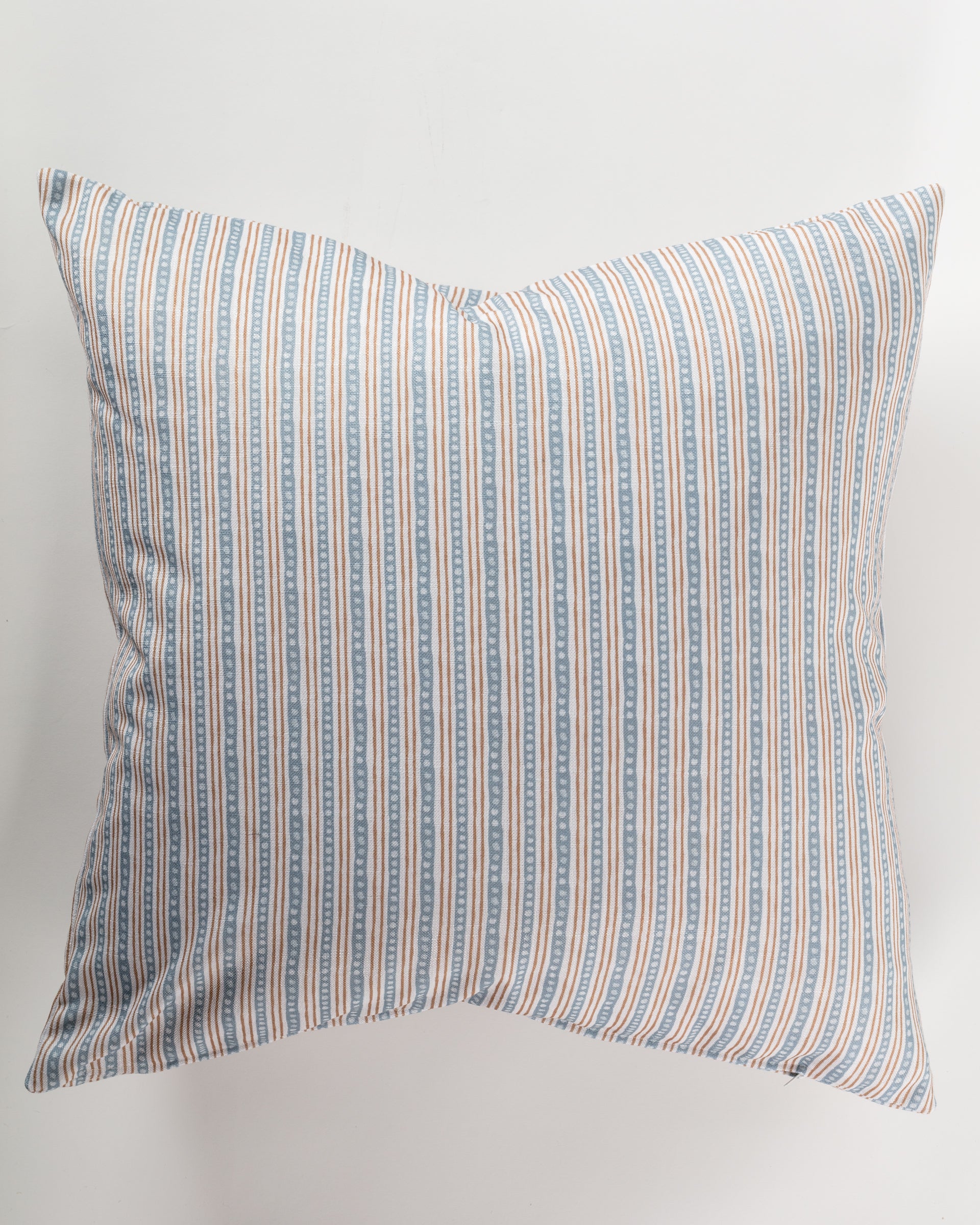 Introducing the Custom 4 Pillow 28x28 by Pindler, a square pillow featuring a striking blue and red vertical striped pattern on a white background. It’s perfect for layering with your luxurious euro pillows to enhance comfort and style.