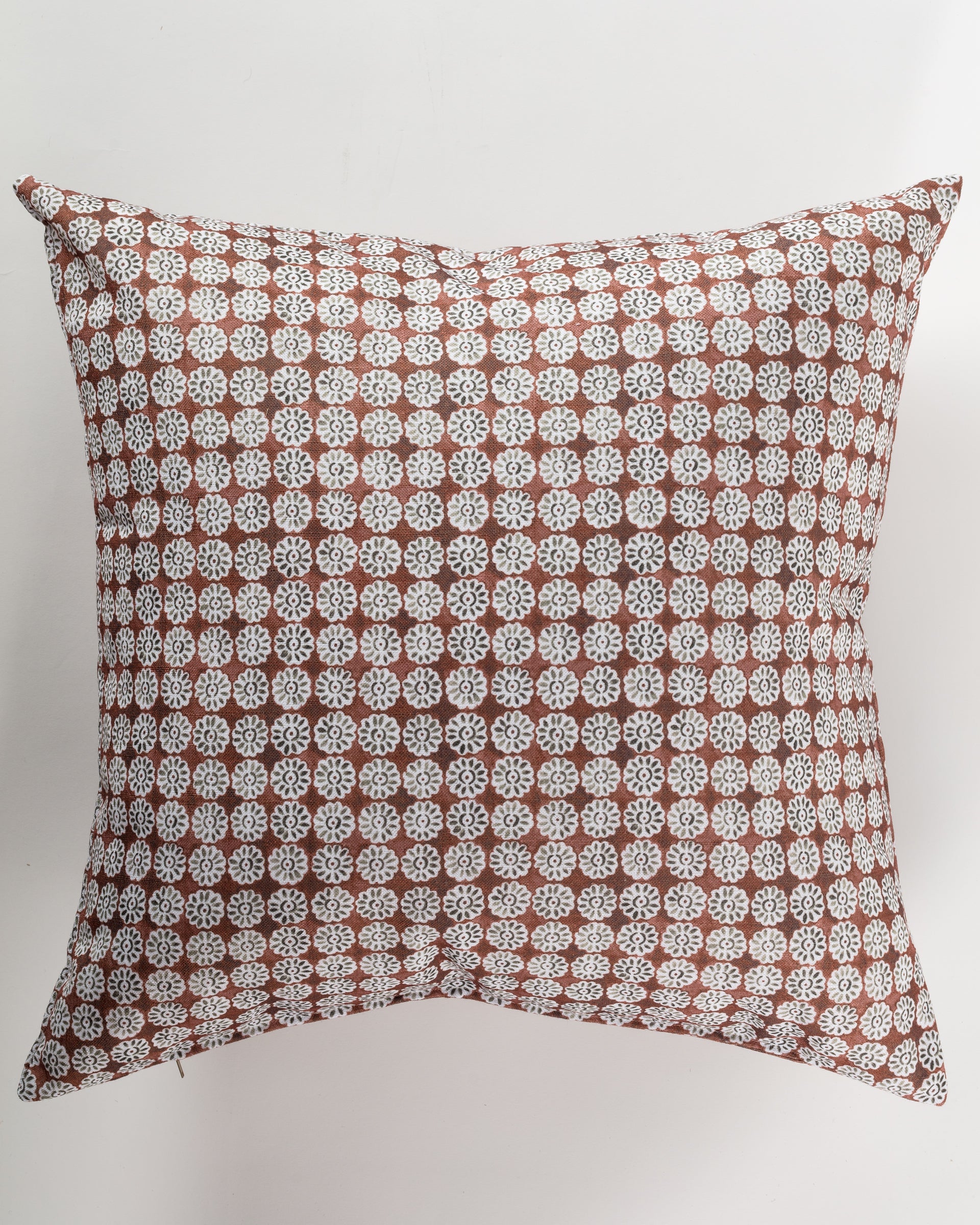 The Custom 4 Pillow 28x28 by Pindler is a square throw pillow showcasing a geometric pattern of white circular motifs set against a brown background. The design is evenly distributed for a symmetrical look, making it ideal for layering with luxurious euro pillows to enhance both comfort and style in your space.