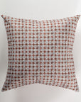 The Custom 4 Pillow 28x28 by Pindler is a square throw pillow showcasing a geometric pattern of white circular motifs set against a brown background. The design is evenly distributed for a symmetrical look, making it ideal for layering with luxurious euro pillows to enhance both comfort and style in your space.