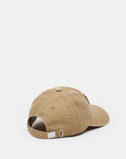 The CLOSED Cap in tan cotton is shown from the back, highlighting a metal buckle on the adjustable strap and visible stitching on the crown and brim for a classic washed finish.