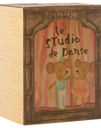 The Maileg Ballet Mice / Little Sis & Bro box by Maileg features two ballet mice on stage under "le Studio de Danse," with pink curtains and a patterned side panel—ideal as a charming ballet playset or mouse house.