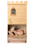 The Maileg Princess & the Pea / Big Sister set features a princess mouse atop stacked mattresses in a cardboard castle box, inspired by the classic fairy tale and crafted by Maileg.
