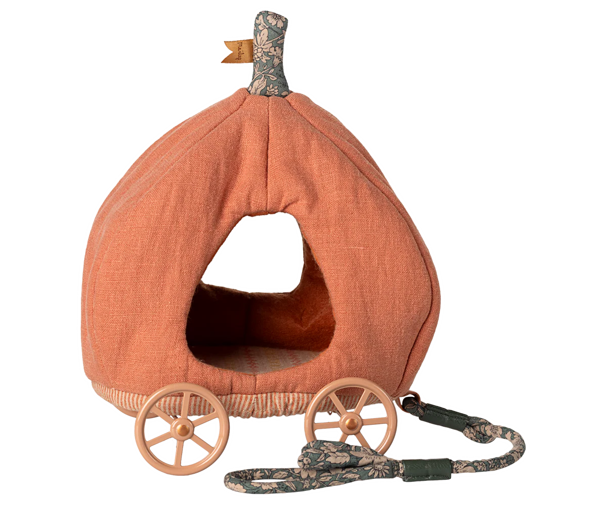 The Maileg Furniture by Maileg is a pumpkin-shaped orange pet bed with a fabric stem, plastic wheels, and a floral-pattern leash—perfect as dollhouse furniture or for your Maileg Mouse, resembling a charming carriage.