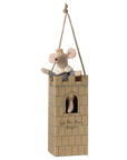 The Maileg Royal Mouse by Maileg wears a crown and cape, sitting on a cardboard castle tower with a window, rope for hanging, and "let the story begin" written on it.