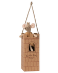 The Maileg Royal Mouse by Maileg wears a crown and sits in a castle-themed cardboard tower with "Let the Story Begin" on the front, hanging from two ropes.