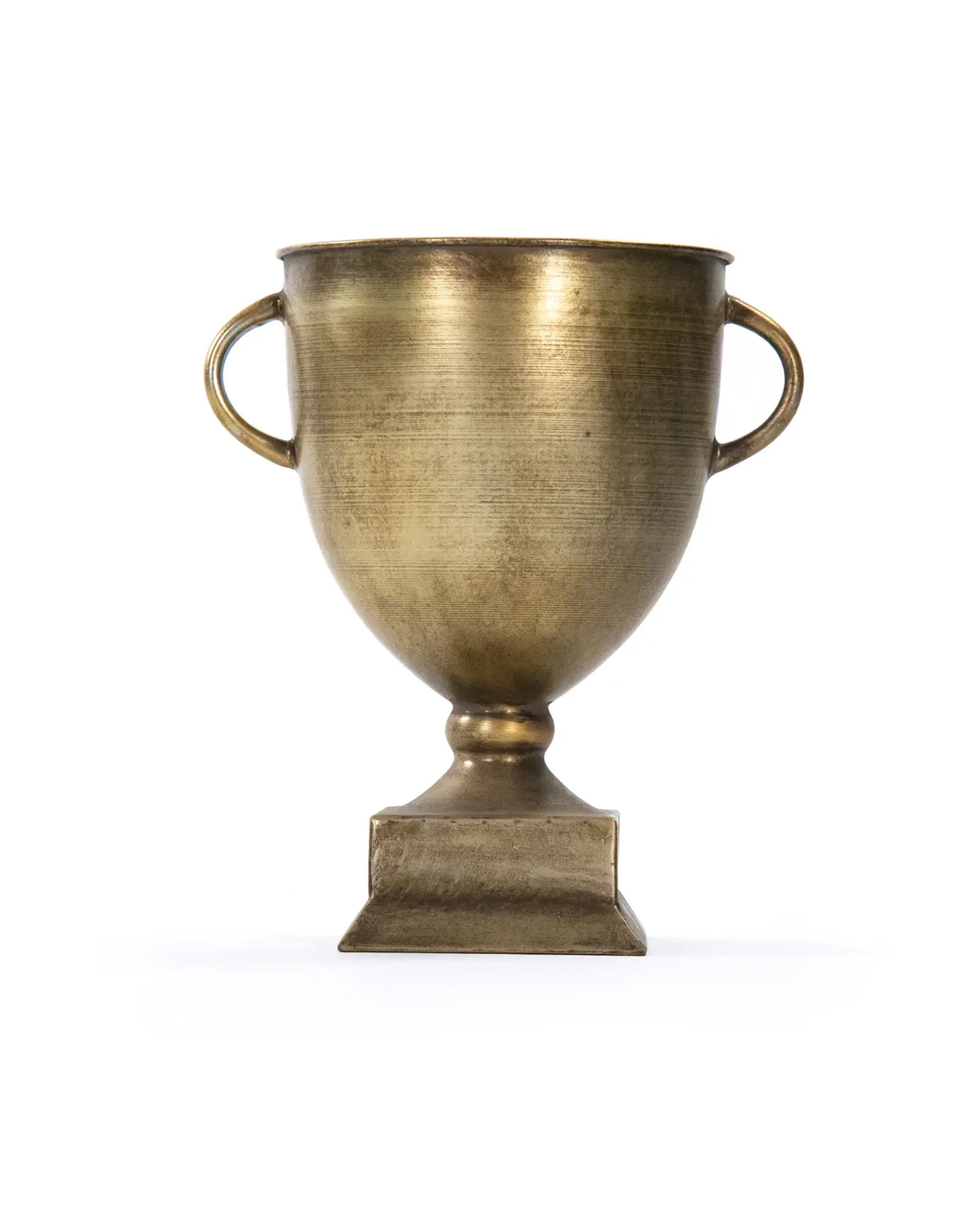 The Zentique G132411 Camille Trophy in antique gold features two handles and a square base, making it a stylish accent or home decor piece. Displayed against a white background for an elegant touch.