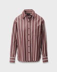 The Rag & Bone connie striped shirt offers a relaxed fit in cotton poplin, with long sleeves, button-up front, maroon fabric with vertical white stripes, and finished with a collar and front pocket.