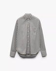 The Rag & Bone connie striped shirt is a black and white cotton poplin, long-sleeved button-up with a relaxed fit, collar, and single chest pocket, shown against a plain white background.