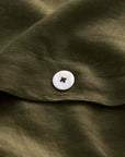 Olive green linen duvet cover with white button detail, Cultiver Goods USA, European flax.