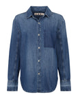 The Ruth Oversized Shirt by AMO Denim is a blue vintage wash denim button-up with long sleeves, a collar, single chest pocket, visible seams, and silver front buttons for a timeless look.